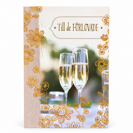 Gratulationskort Till de förlovade med champagneglas och guldfärgade blommor